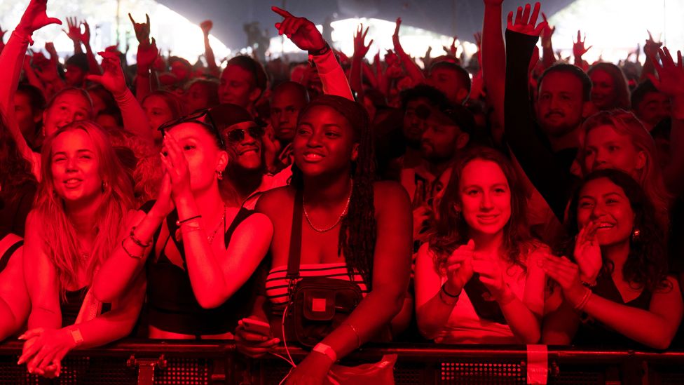 The audience for Nigerian Rema on the Arena Stage cheer on the grounds of Roskilde Festival 2023 - Denmark, June 2023