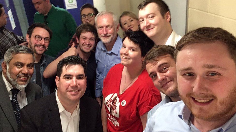 Lauren Stocks with fellow activists, and Jeremy Corbyn, centre