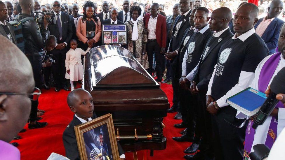 Family members surround the coffin of Kenya's marathon world record holder Kelvin Kiptum, who died in a road accident, during the funeral service at Chepkorio show ground, Elgeyo Marakwet County, Kenya February 23, 2024