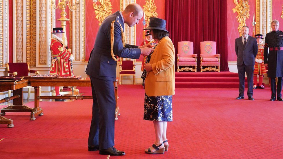 Figen Murray is made an OBE by the Duke of Cambridge at Buckingham Palace