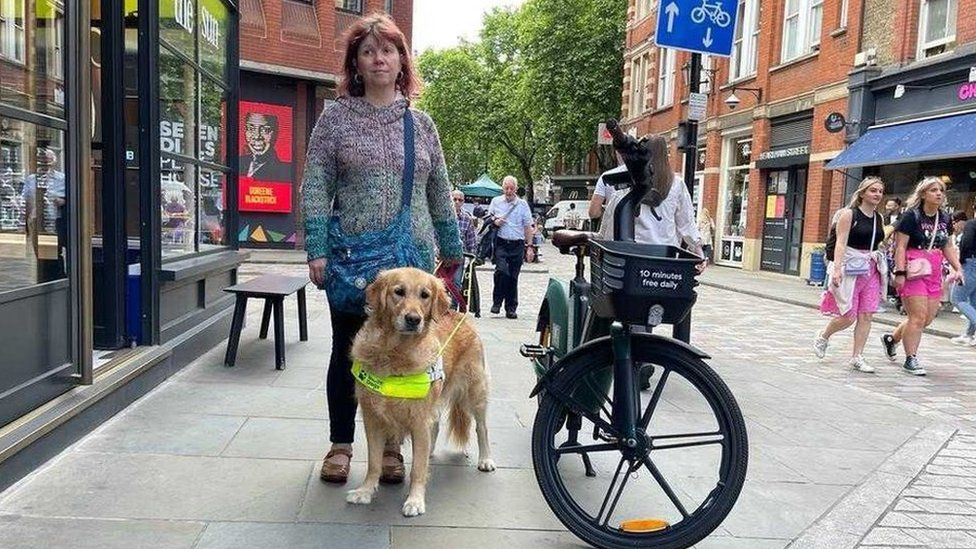 Miss Leadbetter and guide dog Nellie
