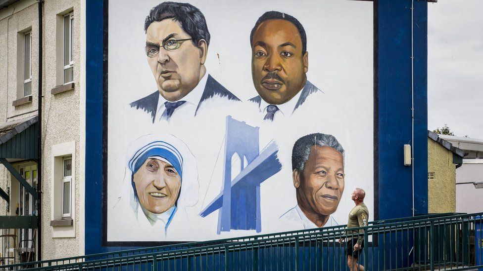 A mural of John Hume with Mother Theresa, Martin Luther King and Nelson Mandela in Derry