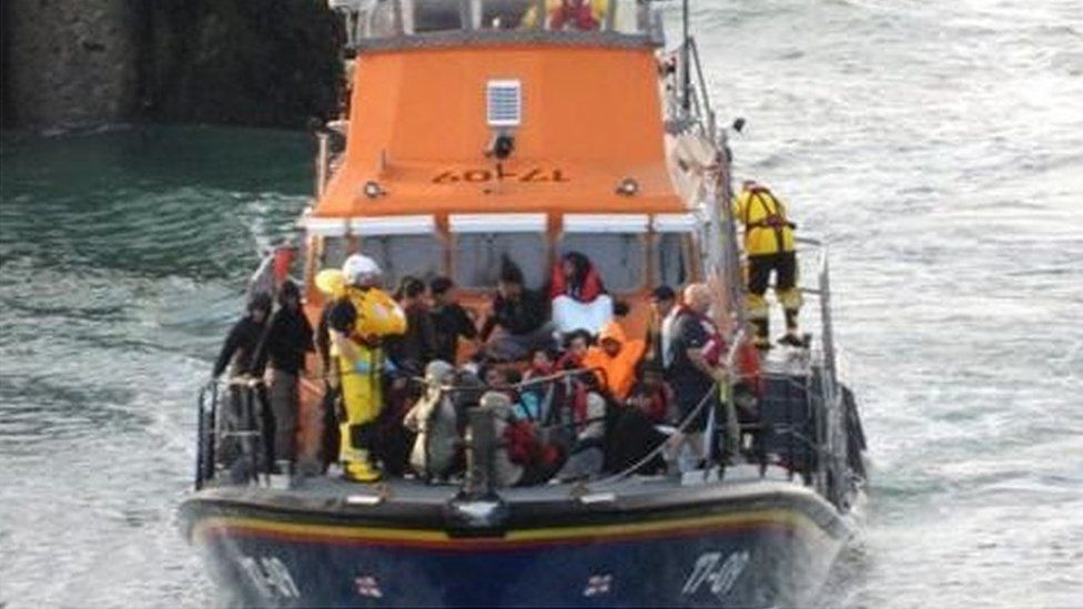 Migrants arrive by lifeboat in Dover