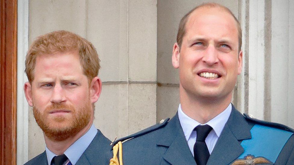 Princes Harry and William watch a flypast to mark the centenary of the RAF, 2018