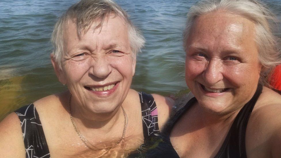 Caroline Page and Ruth Leach in their swimming costumes at the River Deben