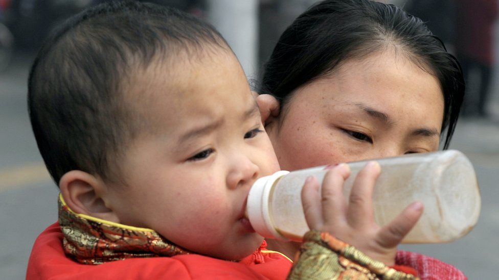 A child drinking milk in Chengdu, in China's southwestern province of Sichuan