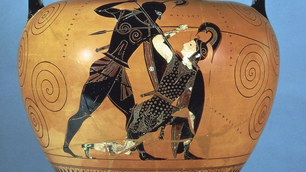Photo of an ancient Greek vase, 5th century B.C. / black-figure pottery - it shows the moment Achilles kills Penthesilea in combat and thinks he's finally found his match on the battlefield, before realising she was a woman