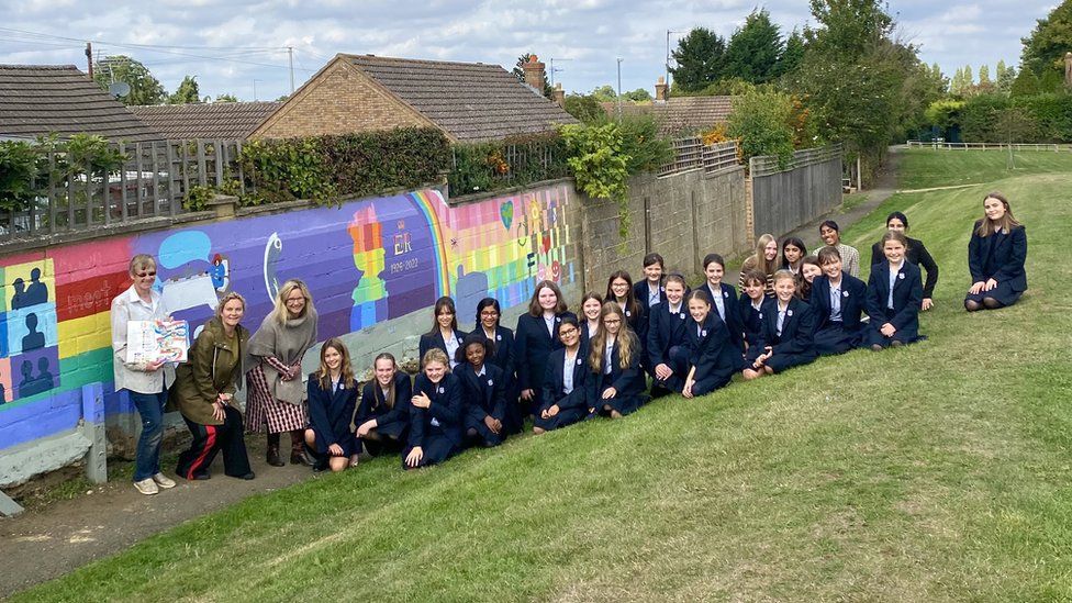 Northampton High pupils at the Hardingstone Jubilee mural