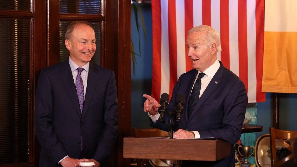 Handout photo issued by Government of Ireland of US President Joe Biden (right) at The Windsor with Tanaiste Michael Martin in Dundalk, Co Louth, during his trip to the island of Ireland