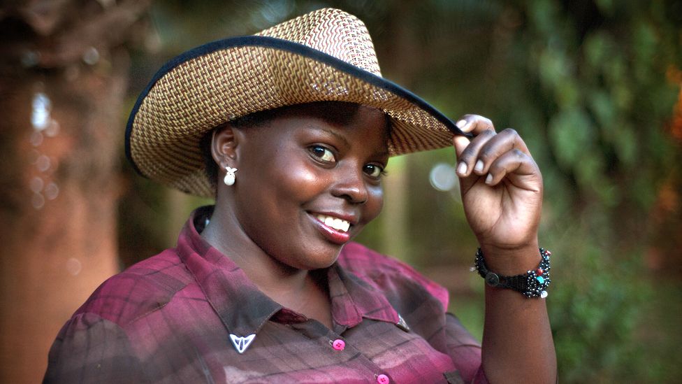 Maria Nakiweewa, 23, wears a cowboy hat in Kampala, Uganda