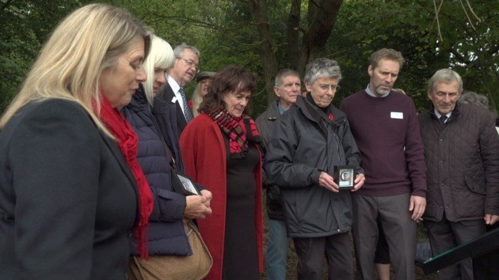 Family members gather in Ipsden for the unveiling of a memorial plaque