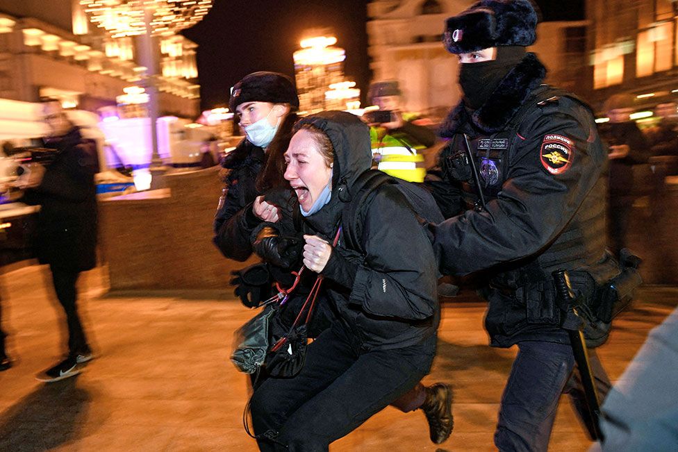 Police officers detain a demonstrator during a protest against Russia's invasion of Ukraine in Moscow, Russia, on 24 February 2022
