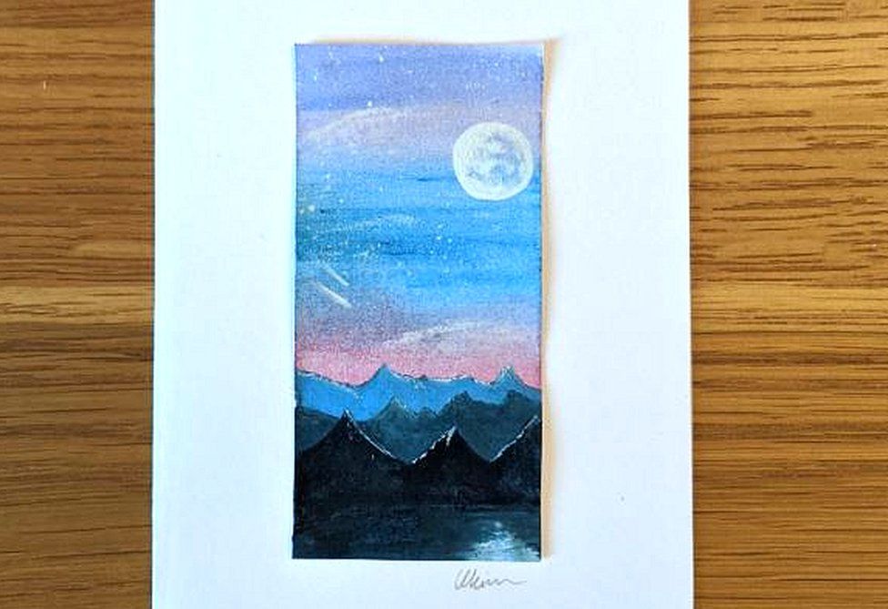 Painting of mountains and moon
