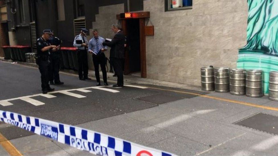 Police outside a bar in Eagle Lane, Brisbane, where Mr Ofner died