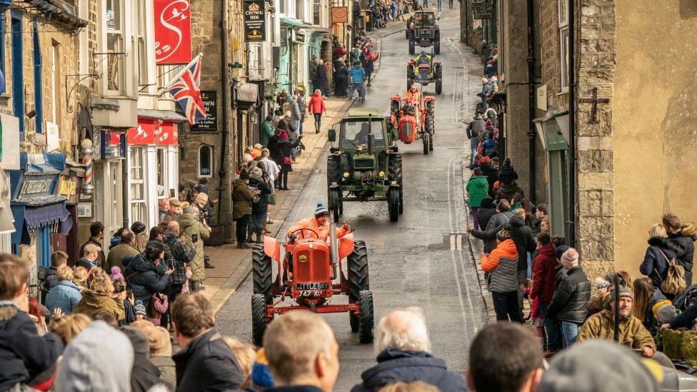 A convoy of tractors through Knaresborough