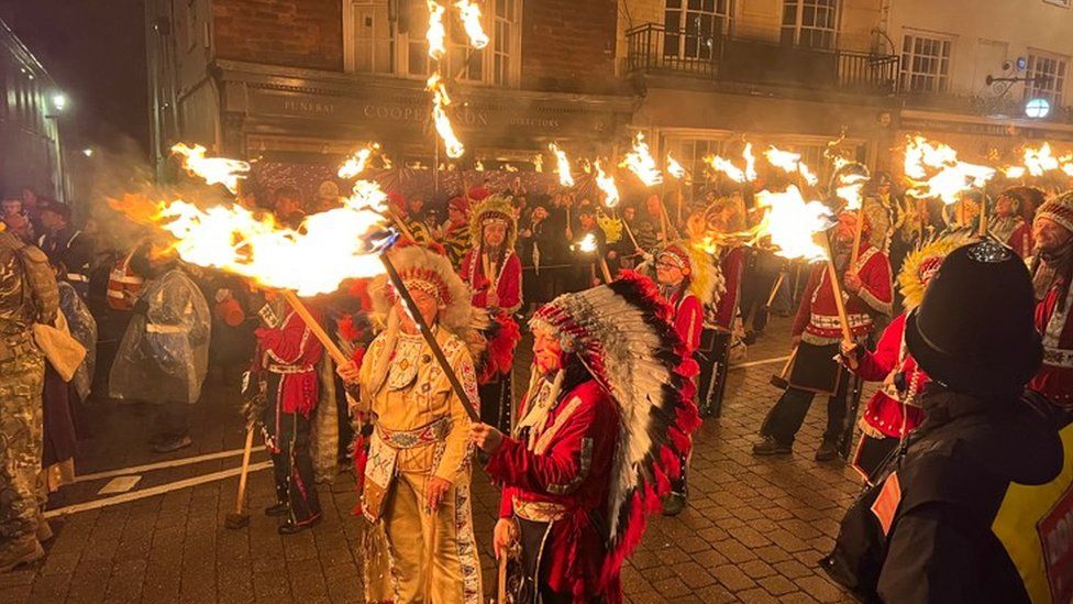 Members of Commercial Square bonfire society march through the cobbled streets of Lewes for bonfire celebrations