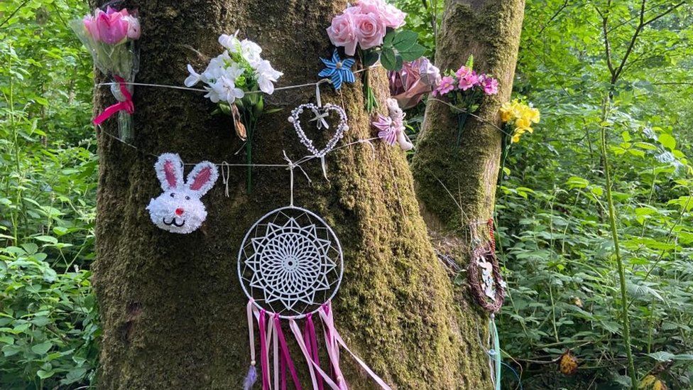 A tree decorated with a floral and Easter themed tribute in Haverfordwest