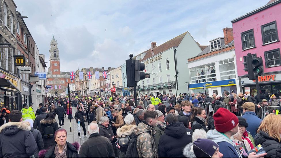 Crowds line the street in Colchester