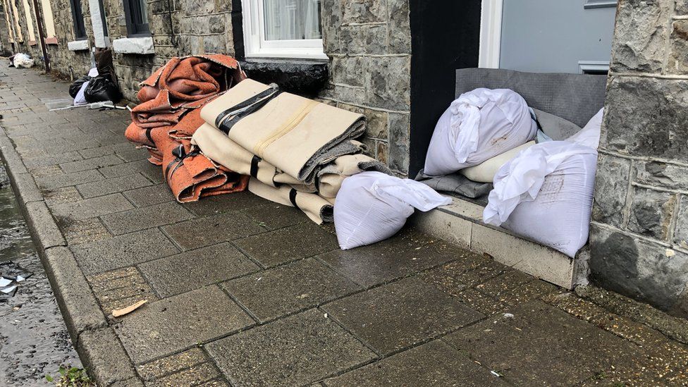 Carpets have been removed from homes following the flooding in Pentre