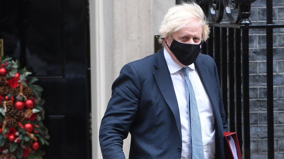 Boris Johnson wears a mask at Downing Street this week