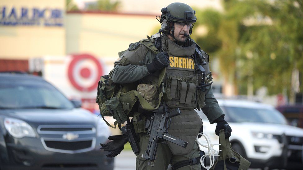 SWAT team member arrives at scene of shooting - 12 June