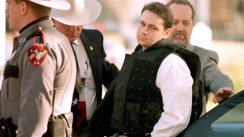 In this file photo taken on February 24, 1999 John William King (C) is escorted into the Jasper County Courthouse for the penalty phase of his capital murder trial in Jasper, Texas. - John William King, is set to be executed on April 23, 2019, barring a last-minute stay of execution, for the murder of James Byrd Jr. after he was dragged behind a pickup truck for over 3 miles in June 7, 1998.
