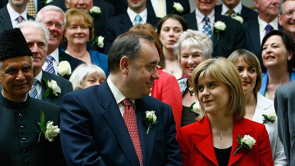 Alex Salmond SNP leader and Nicola Sturgeon deputy leader stand with SNP's 47 newly elected MSP's after taking their oath in a swearing in ceremony at the Scottish Parliament May 9, 2007 in Edinburgh, Scotland