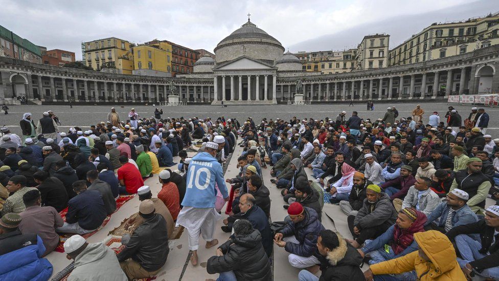 Muslims gathered on a square in Naples, Italy.