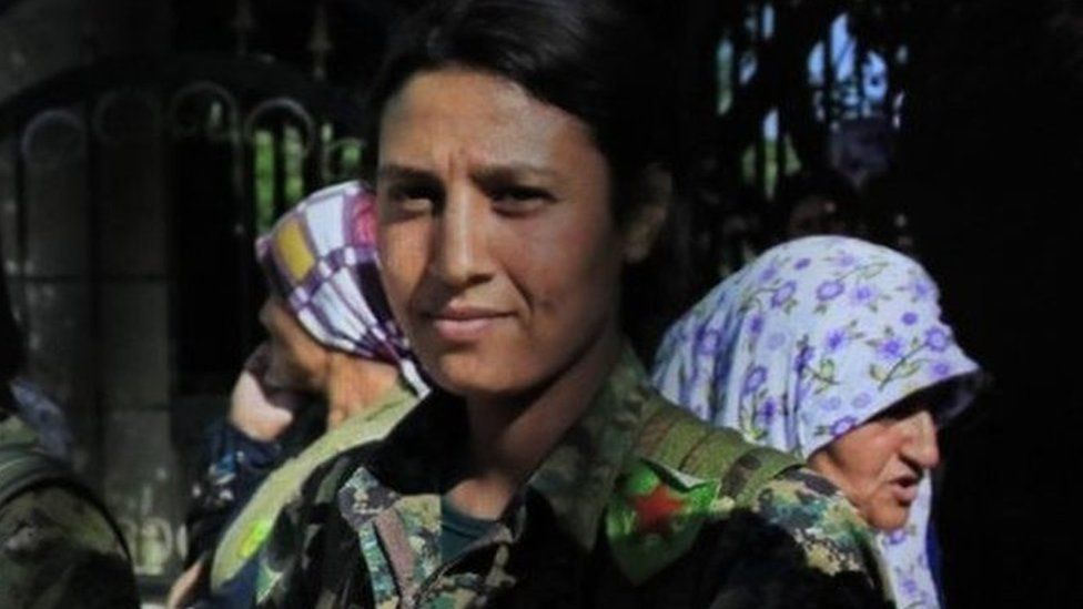 Kurdish female fighter Barin Kobani (centre)