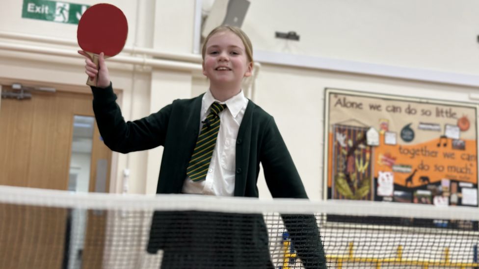 Amelia playing table tennis