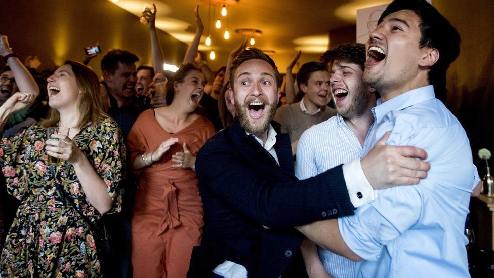 Members of the Labour Party (PvdA) celebrate after the exit polls of the European Parliament elections The Hague,