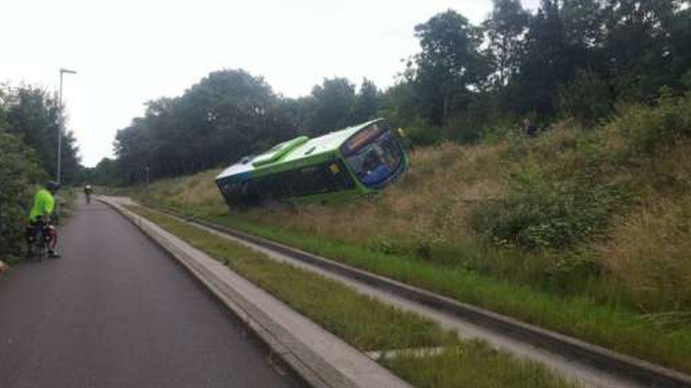 Image of the bus on the causeway