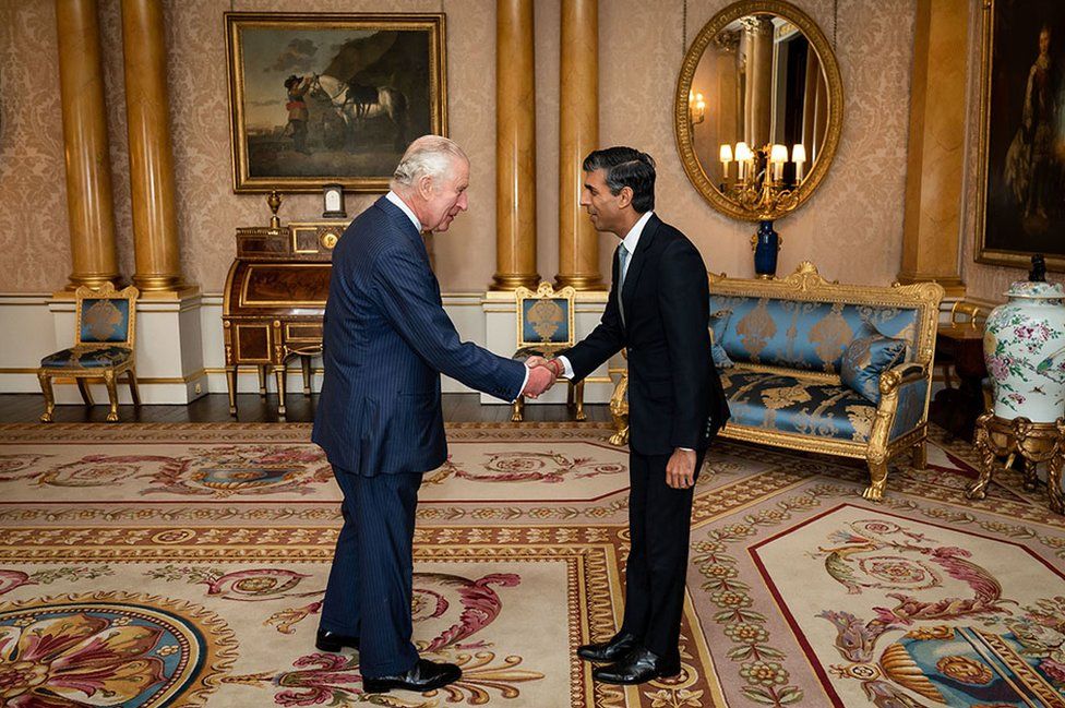 King Charles III welcomes Rishi Sunak during an audience at Buckingham Palace