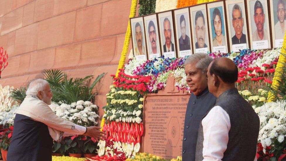 Indian Prime Minister Narendra Modi pays floral tribute to the martyrs who lost their lives in the 2001 terror attack on Parliament House (Samvidhan Sadan).