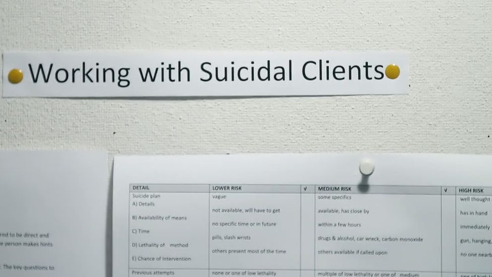 Pin board with notes on how to work with suicidal callers