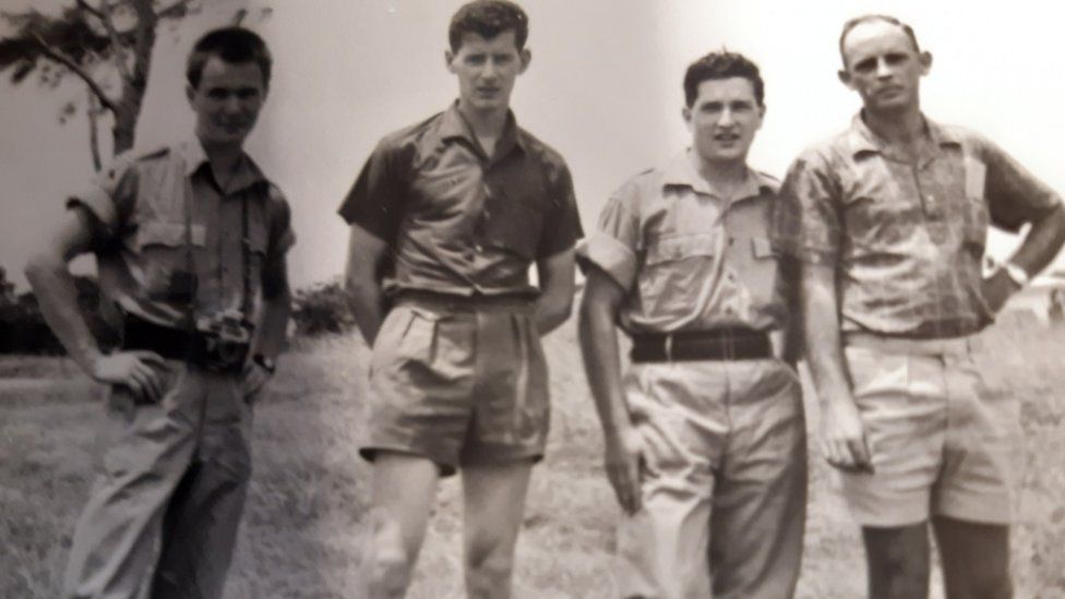 (Left to right) John Ware, an unknown local man, fellow Royal Marine musician Rodney Preston and a second unknown local man pictured in Dar-es-Salam, Tanganyika in early 1964