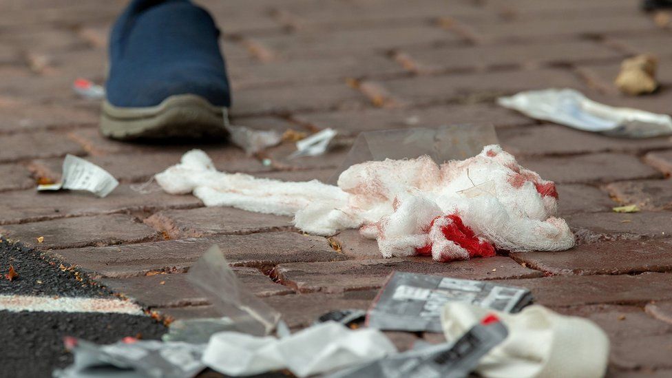 Bloodied bandages on the road following a shooting at the Al Noor mosque in Christchurch.