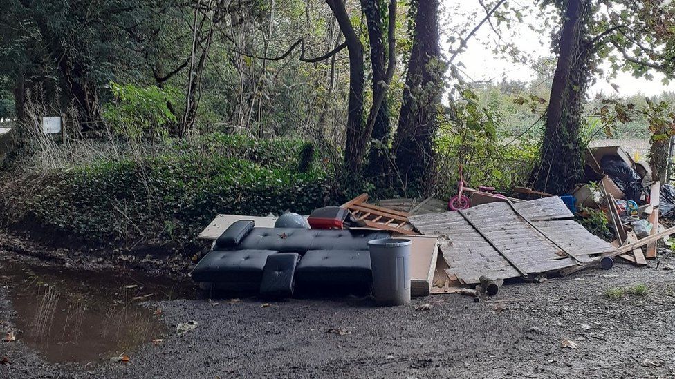 Furniture that has been fly-tipped in the woods