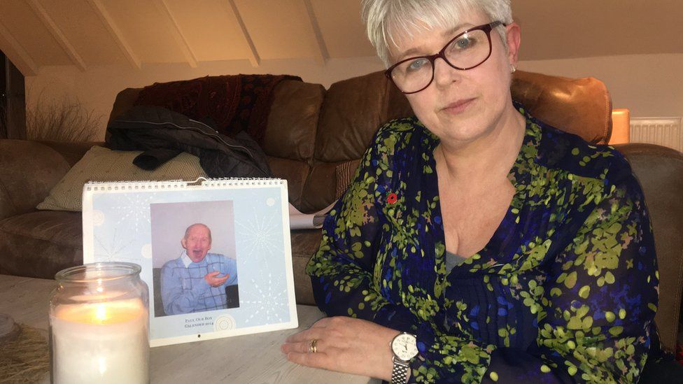Jayne Nicholls with a photo of late brother Paul Ridd
