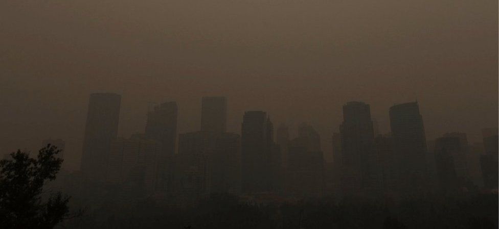 A haze from the wildfires in British Columbia descends on Calgary, Alberta