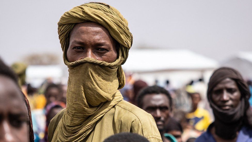 A refugee stands in Goudebou camp in northern Burkina Faso - Sunday 20 June 2021