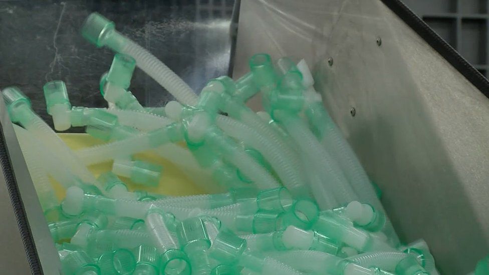 Plastic tubes in a container