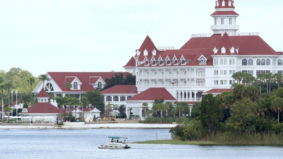 A boat belonging to the Orange County Sheriff's office searches the Seven Seas lagoon outside Disney's Grand Floridian Resort & Spa near Orlando, Florida on June 15, 2016.