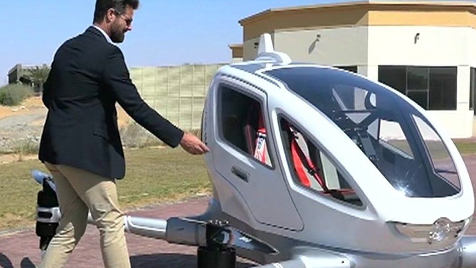 Man opens door of drone