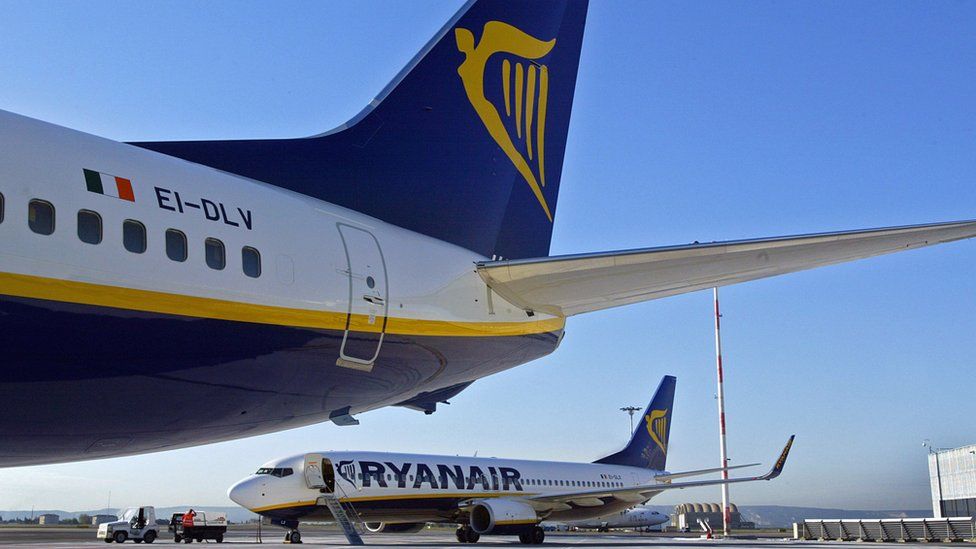 Two Ryanair planes at an airport