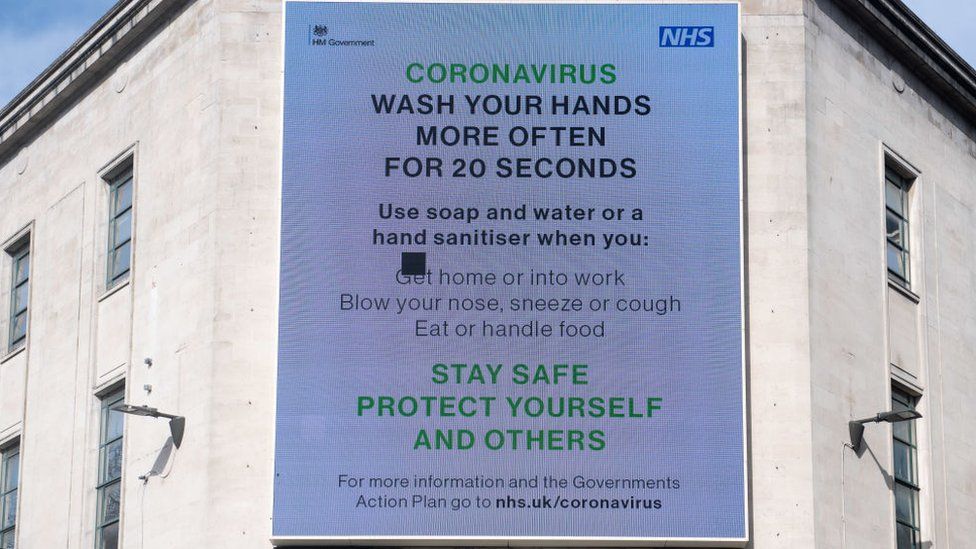 A sign warning of Covid spread