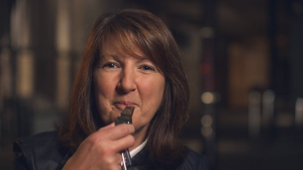 Retired Detective Inspector Jan Connolly with the whistle she was given to summon help