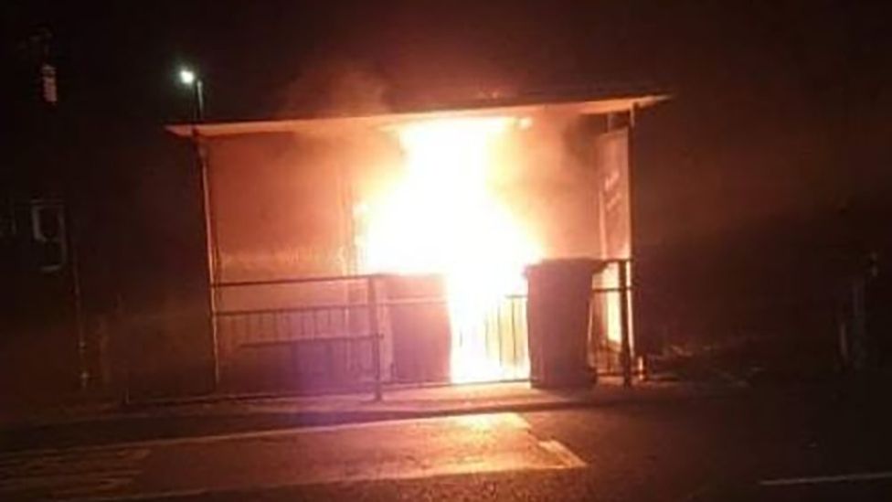 Bus shelter on fire