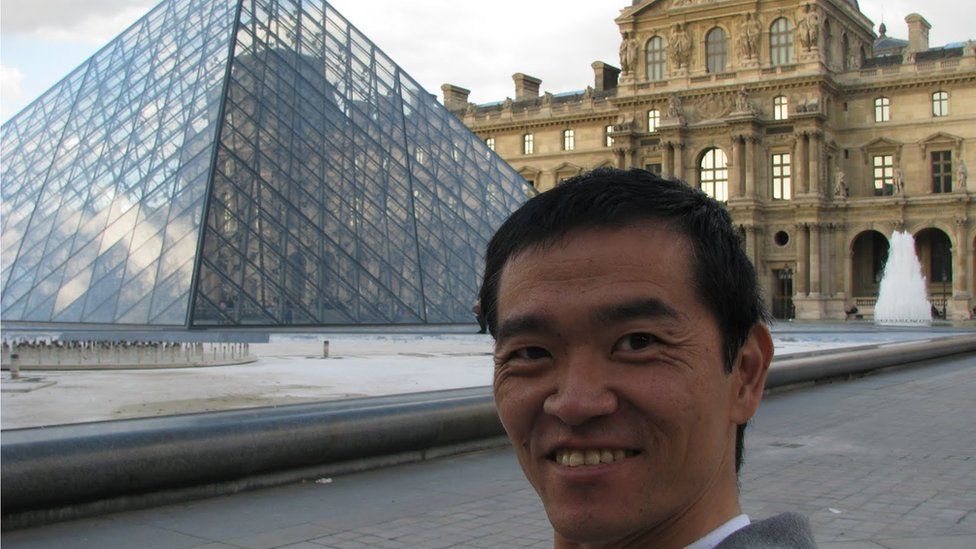 Ricardo Shimosakai outside the Louvre in Paris