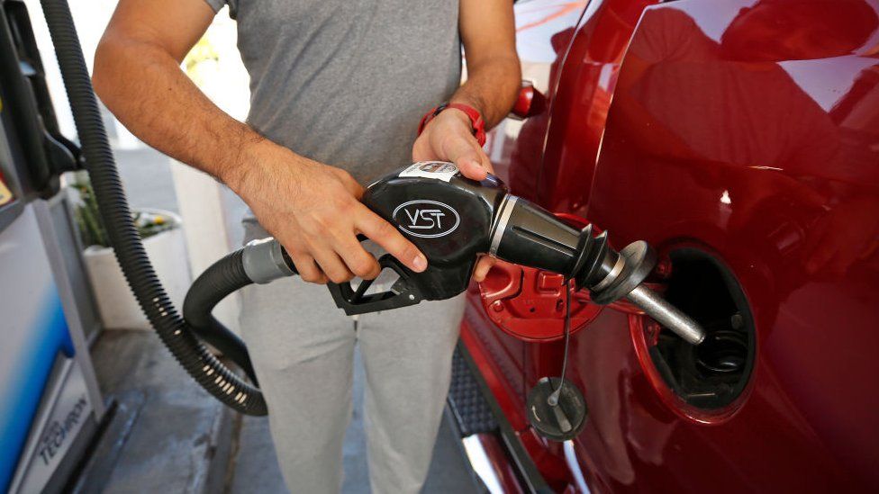 Man fills this truck with fuel in Los Angeles.